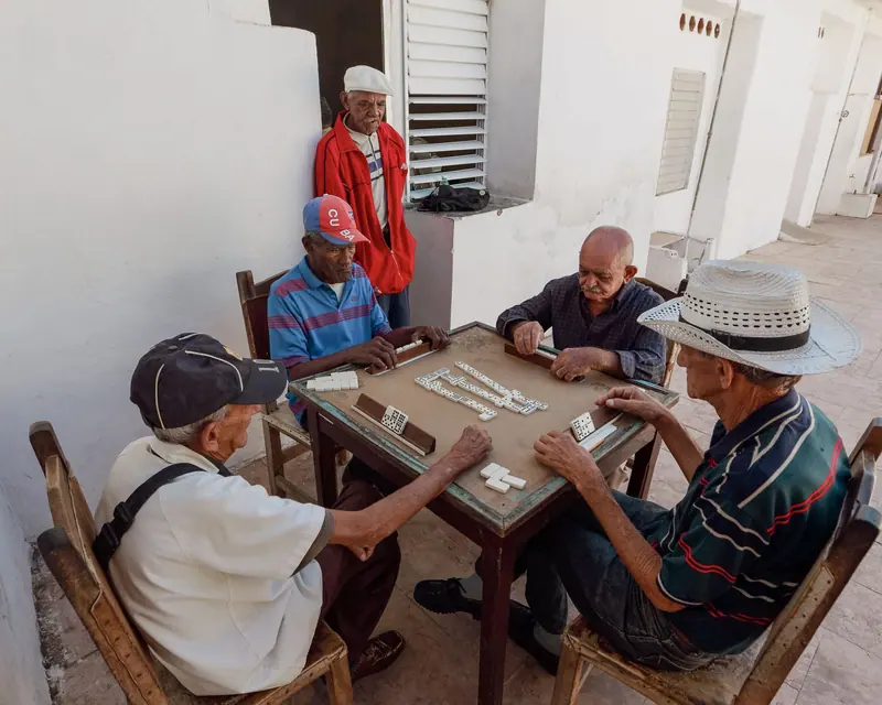 The morning domino game on the back patio