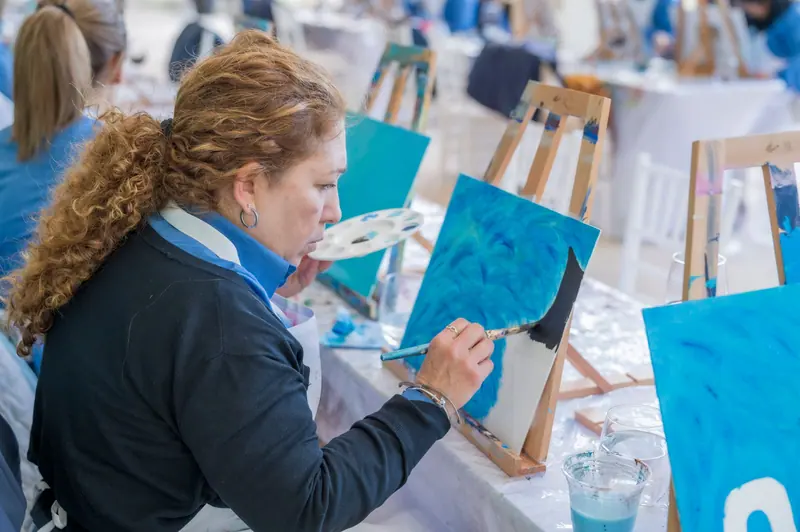 At the easel