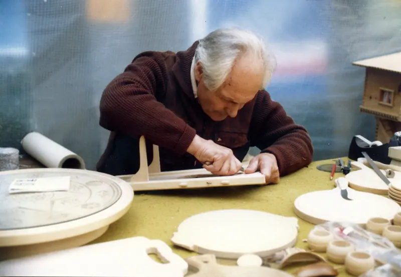 Carving at the woodshop bench