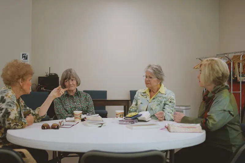 Women gathered with their Bibles for Thursday study