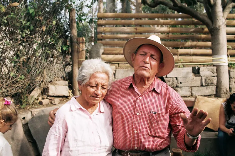 A married couple, both members, outside the old bank after lunch