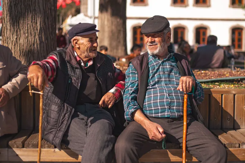 Two old friends on the bench out front