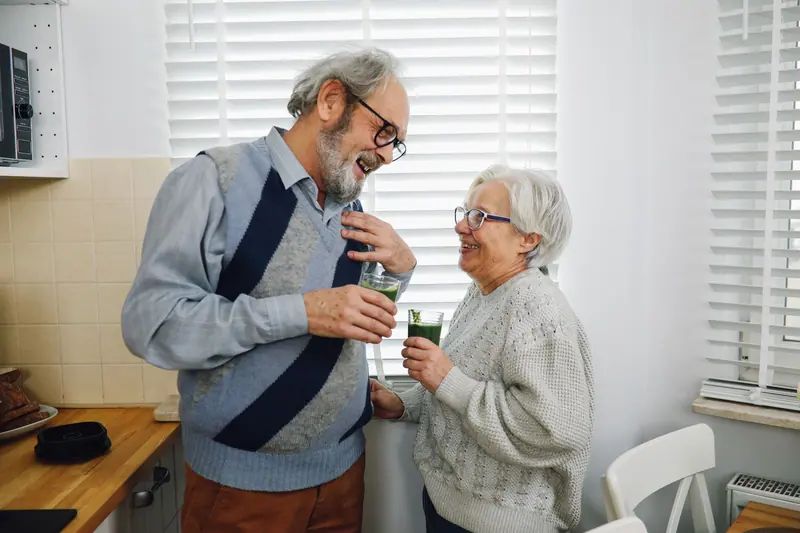 A couple sharing coffee before the van