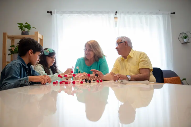 Grandkids helping with a puzzle