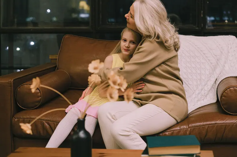 A hug on the sofa from a granddaughter