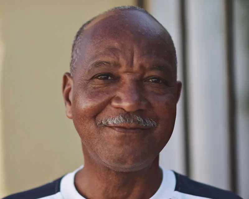 A resident with a warm smile