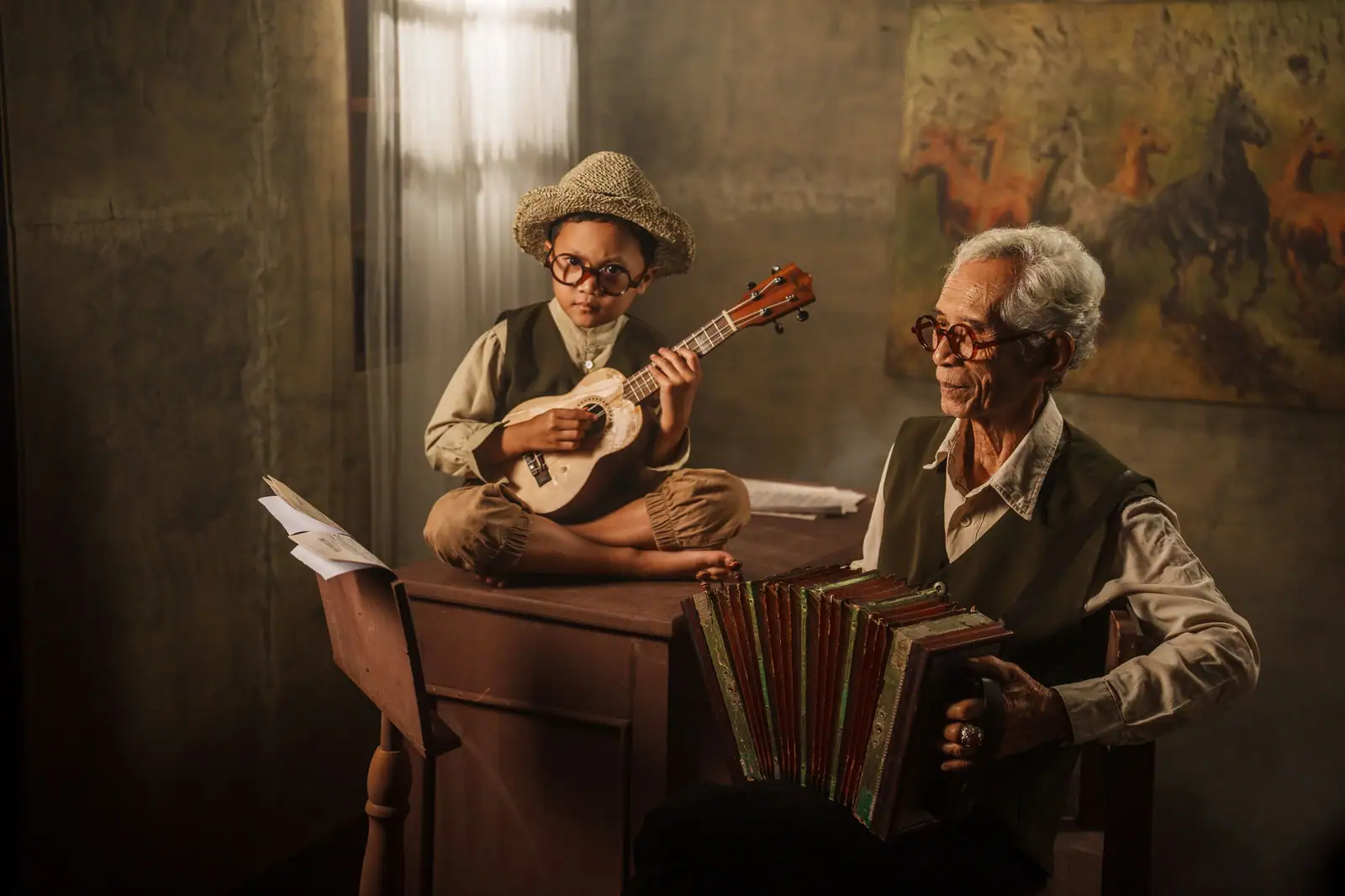 A resident playing his accordion while a young grandson strums a ukulele in the lamp-lit parlor