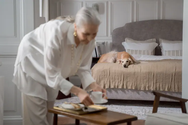 A resident with her greyhound on a slow morning
