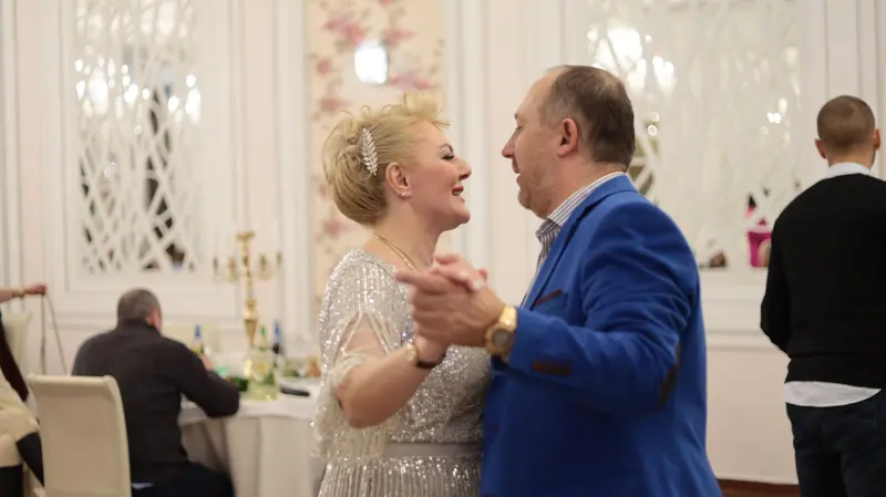 A couple dancing at a celebration