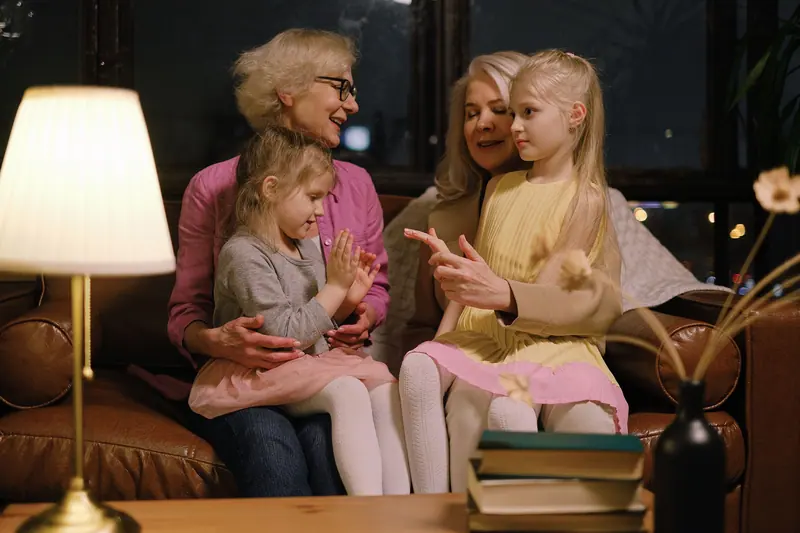 A family gathered on the sofa