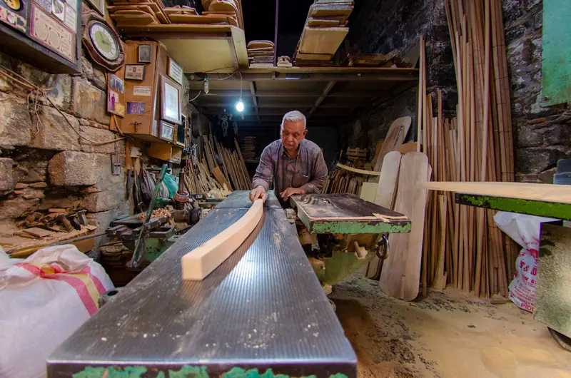 A resident at work in the woodshop