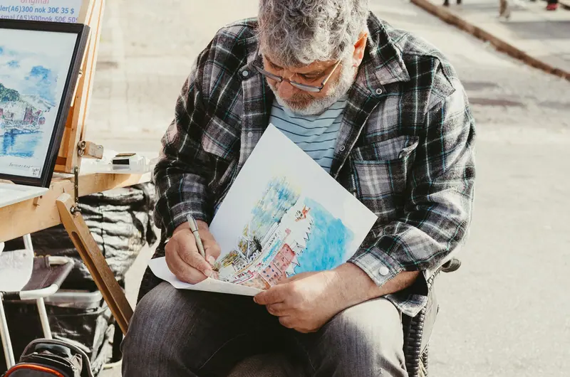 A resident sketching outdoors