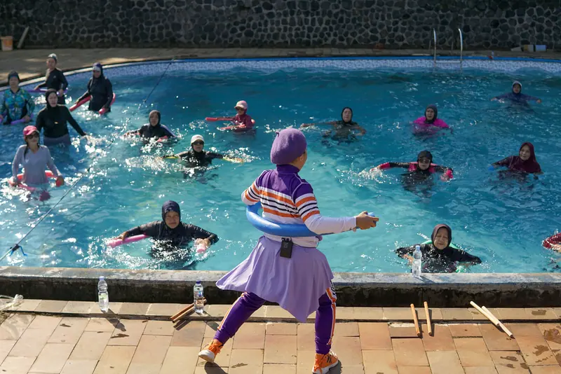 The morning water aerobics class in the pool