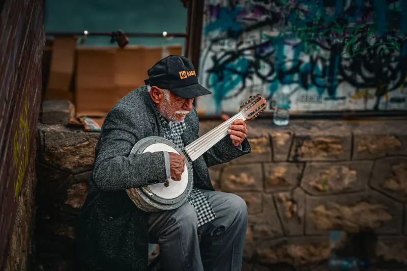 A resident playing the banjo
