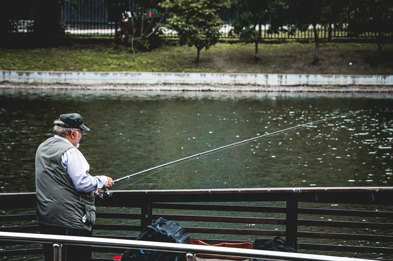A resident fishing from the shore