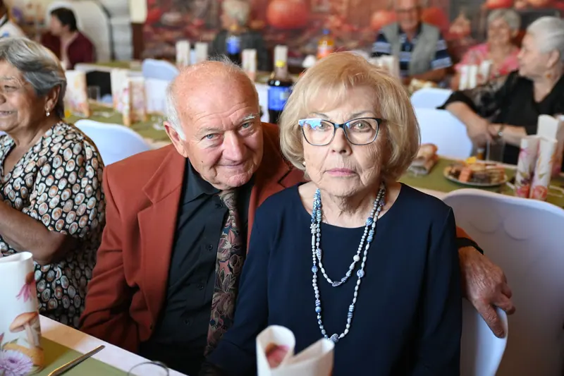 A couple at the anniversary banquet in the Terrace Room