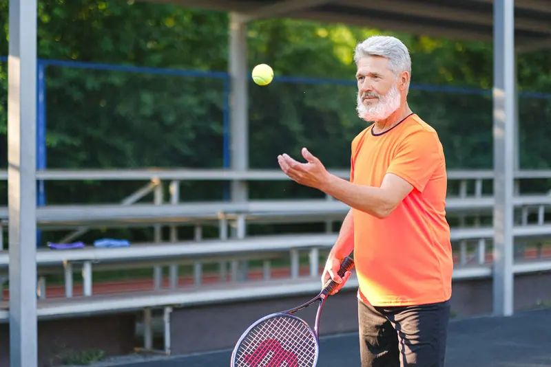 A resident on the tennis court