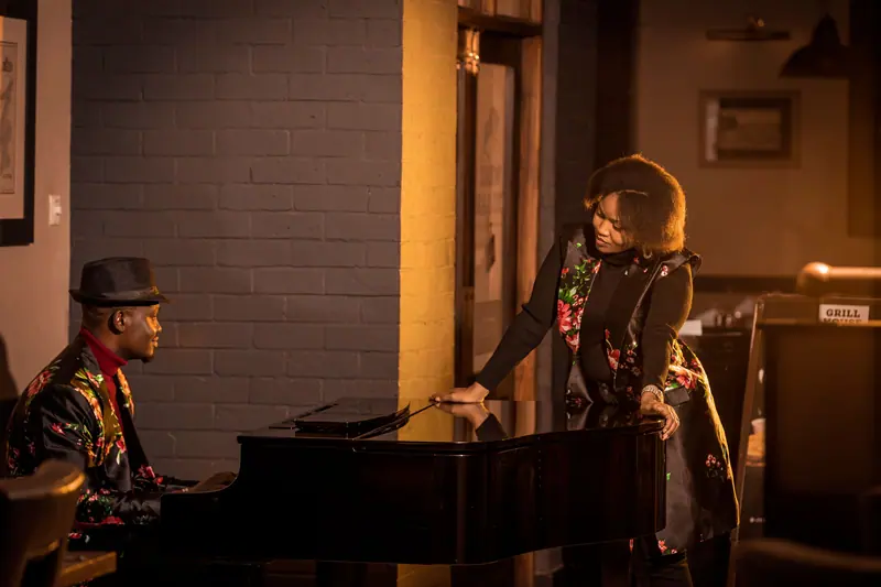 A piano and vocal duet in the Salon