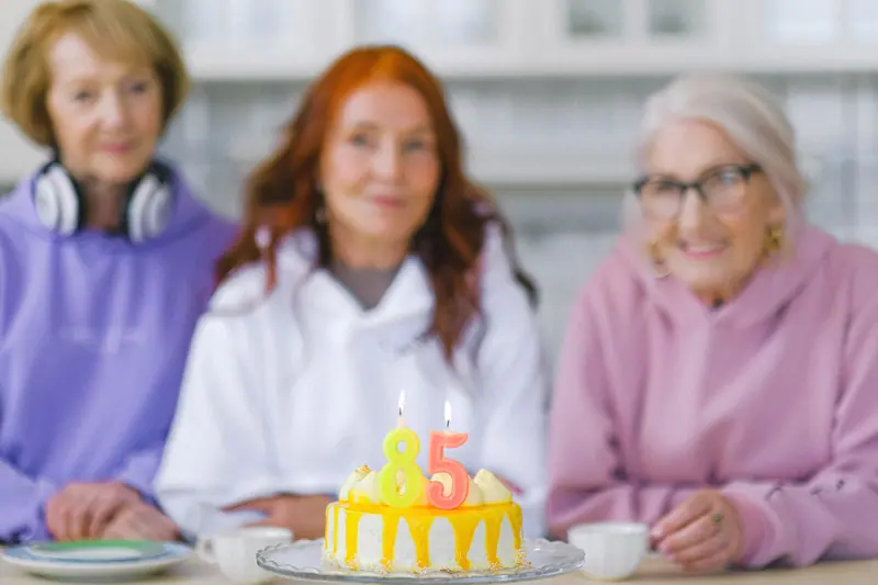 Three friends celebrating an 85th birthday