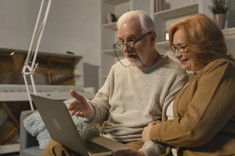 A couple on a video call with the grandkids