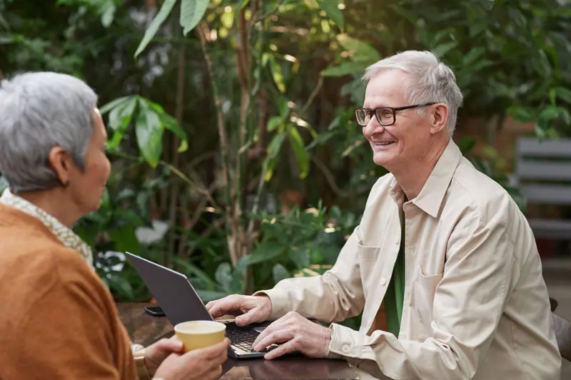A couple at a garden café