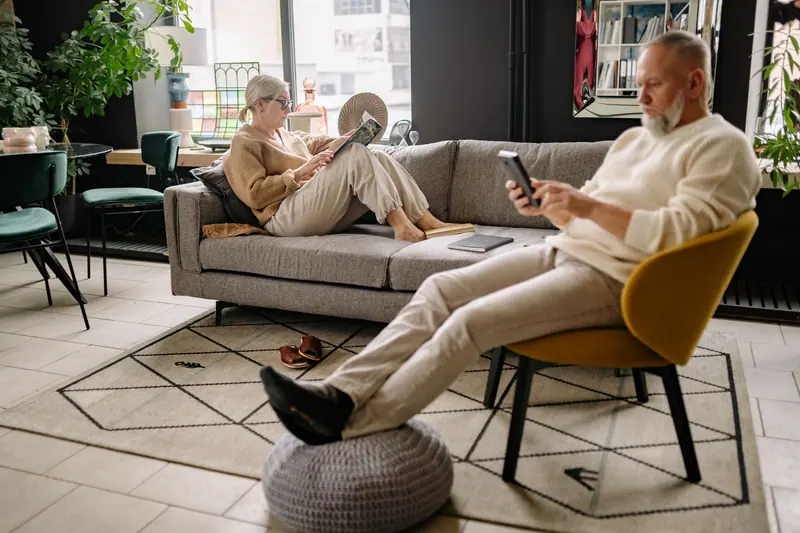 A couple relaxing in their living room
