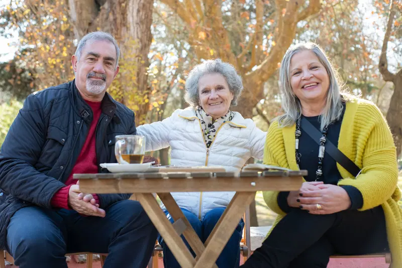 Friends sharing a table in the beer garden