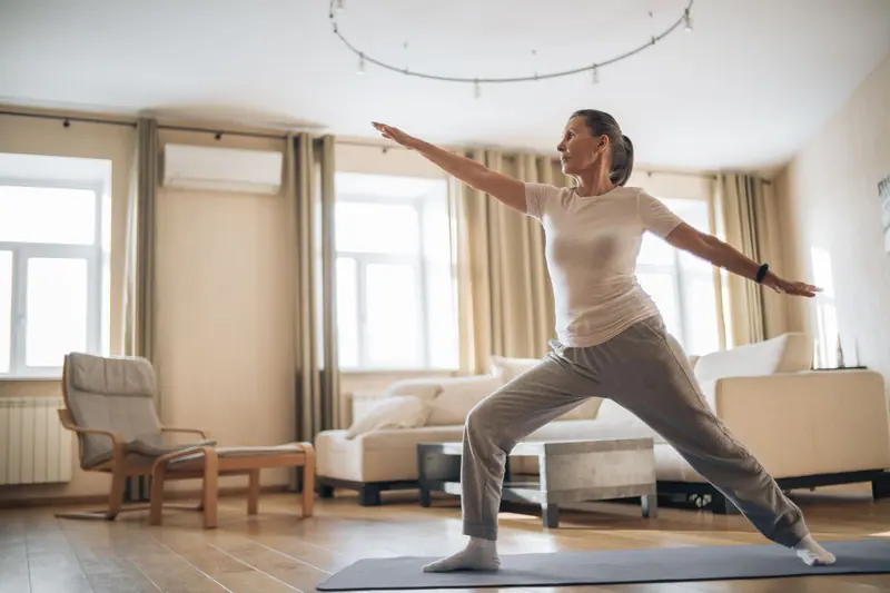 A resident stretching at home