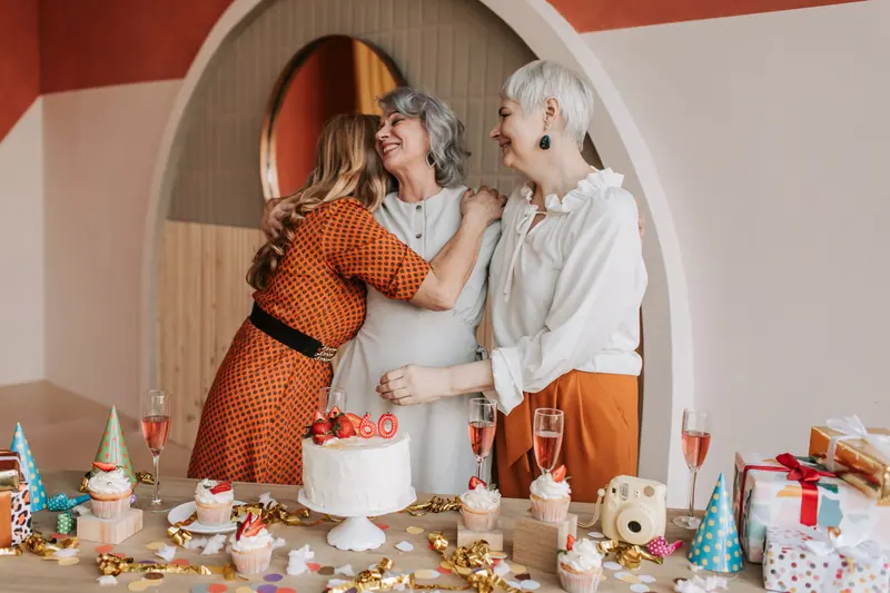 Friends celebrating with cake