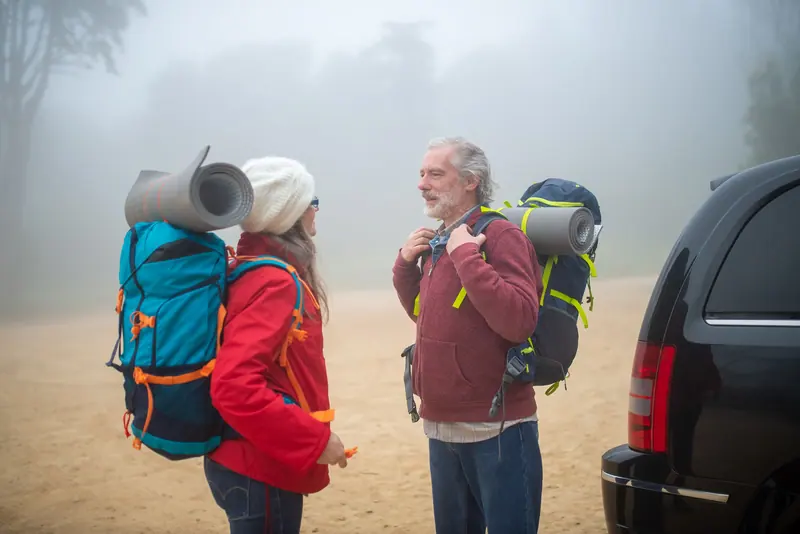 A couple getting ready for a hike