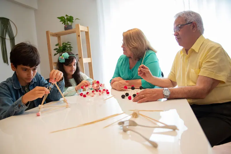 Grandparents building with the grandchildren