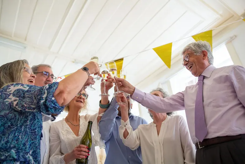 Friends toasting at a party