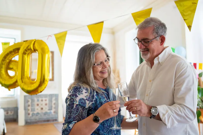 A couple toasting at a birthday