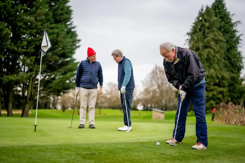 Three friends on the golf course