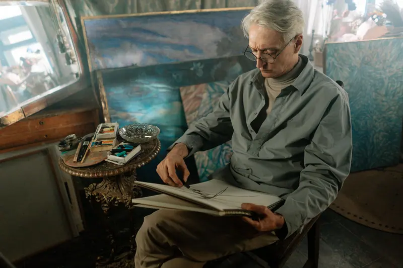 A resident sketching in the studio