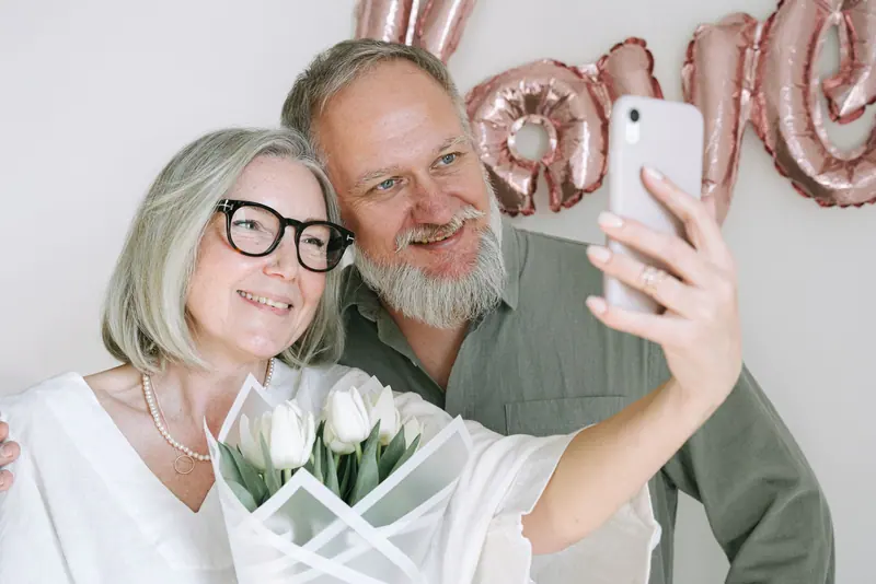 An anniversary selfie with flowers