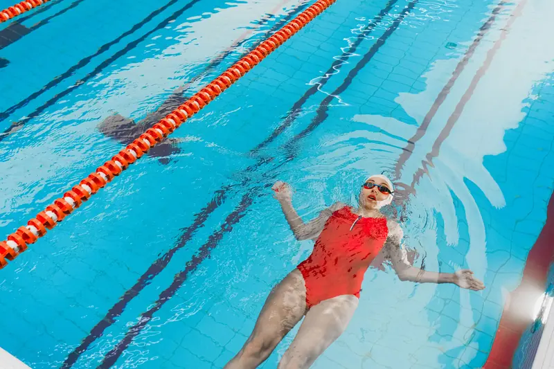 A resident floating in the saltwater pool