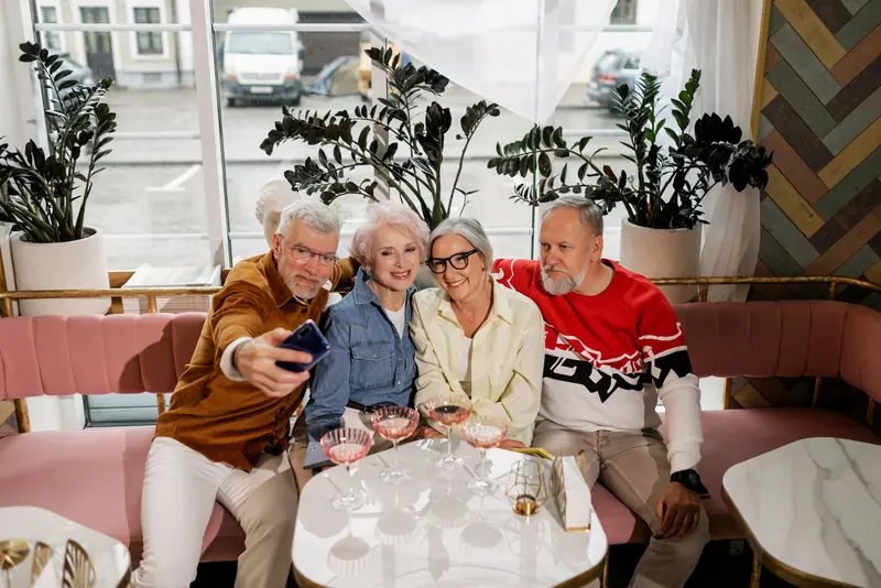 Friends taking a selfie in the café