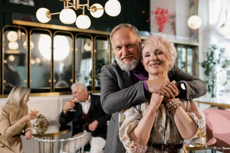 A couple embracing in the café