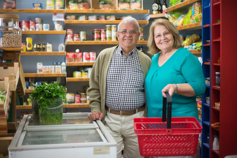 A couple shopping at the grocery