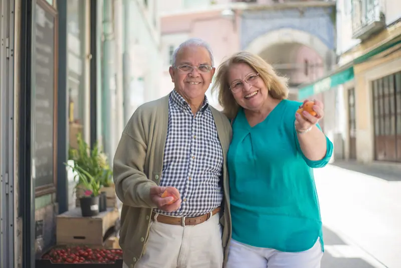 A couple out shopping on a sunny day