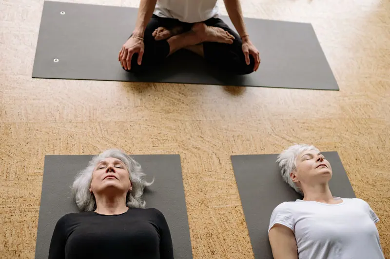 Two friends in yoga class