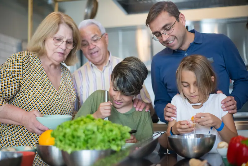 Three generations cooking together