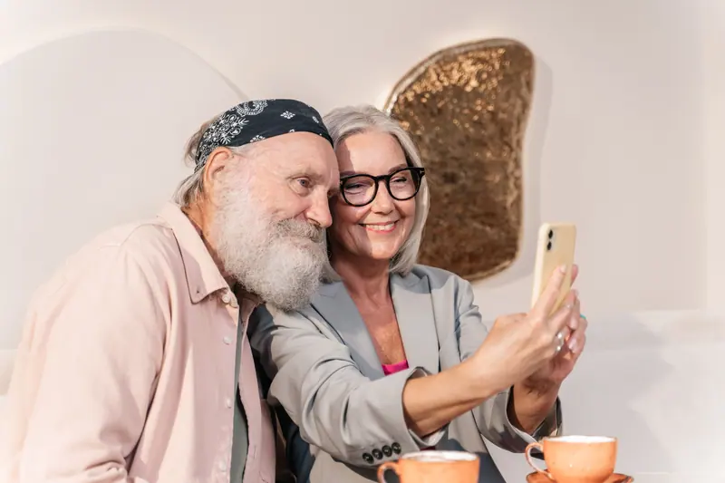 A couple taking a photo together