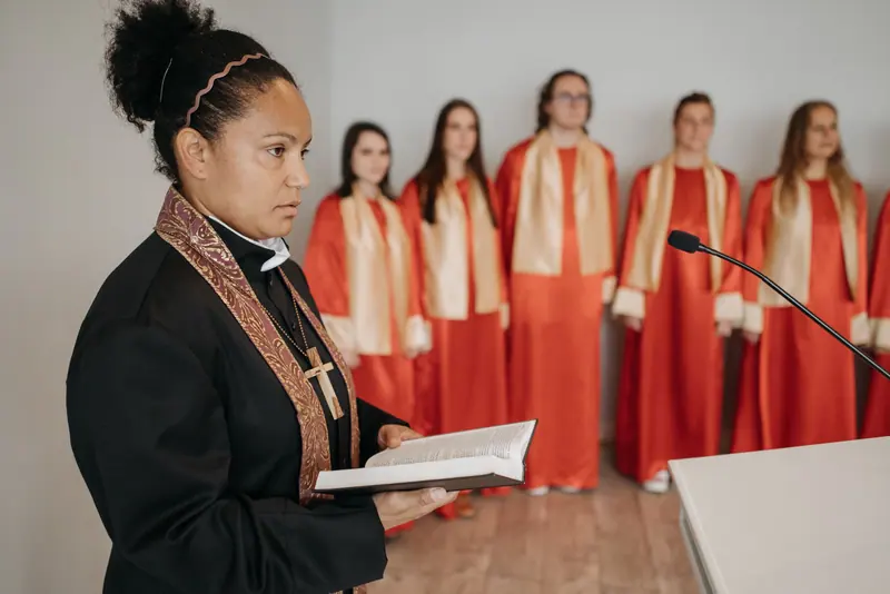A pastor leading the choir