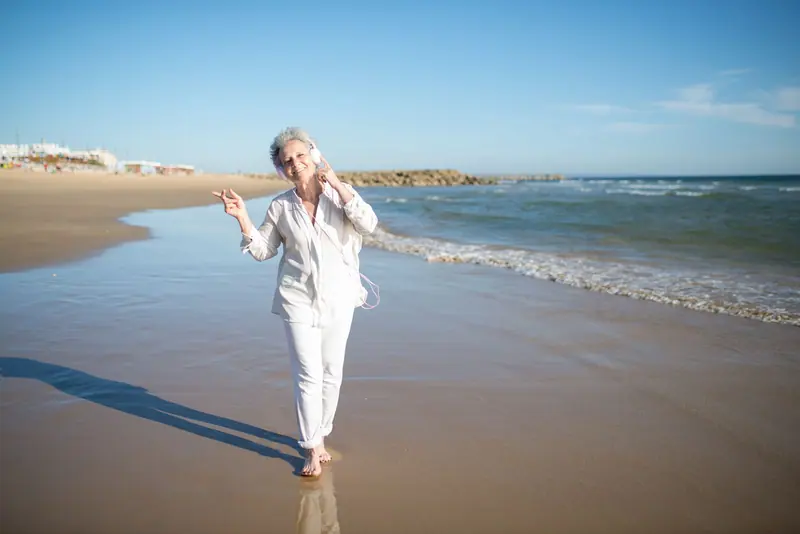 A resident dancing in the surf