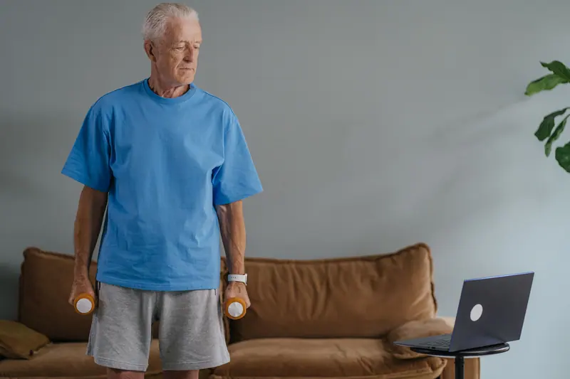 A resident lifting weights at home