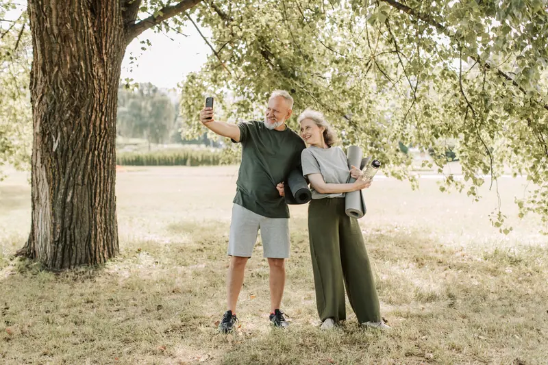 A couple taking a selfie after yoga