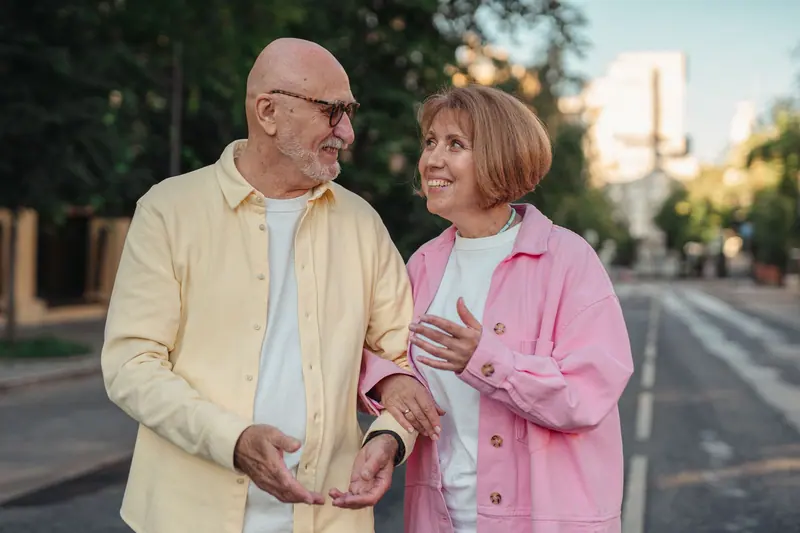 A couple strolling the boulevard