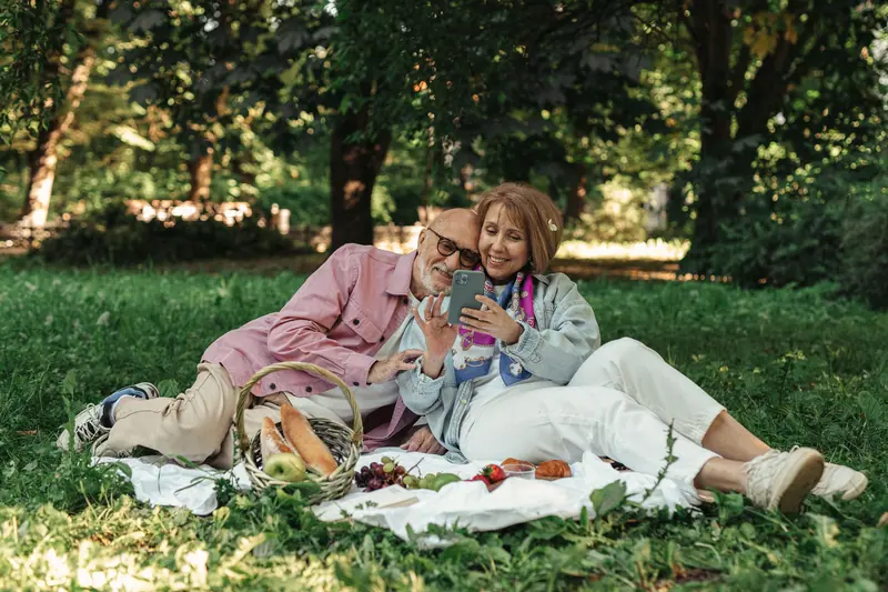 A couple relaxing at a picnic